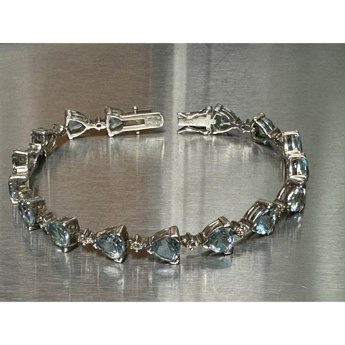 DIT Sterling Silver Trillion Blue Topaz Tennis Bracelet 7 3/4