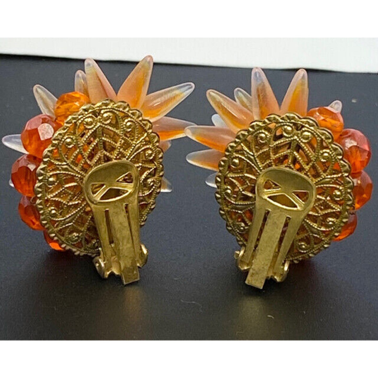 Unsigned Haskell Sunset Orange Art Glass Spikey Star Burst Clip Earrings